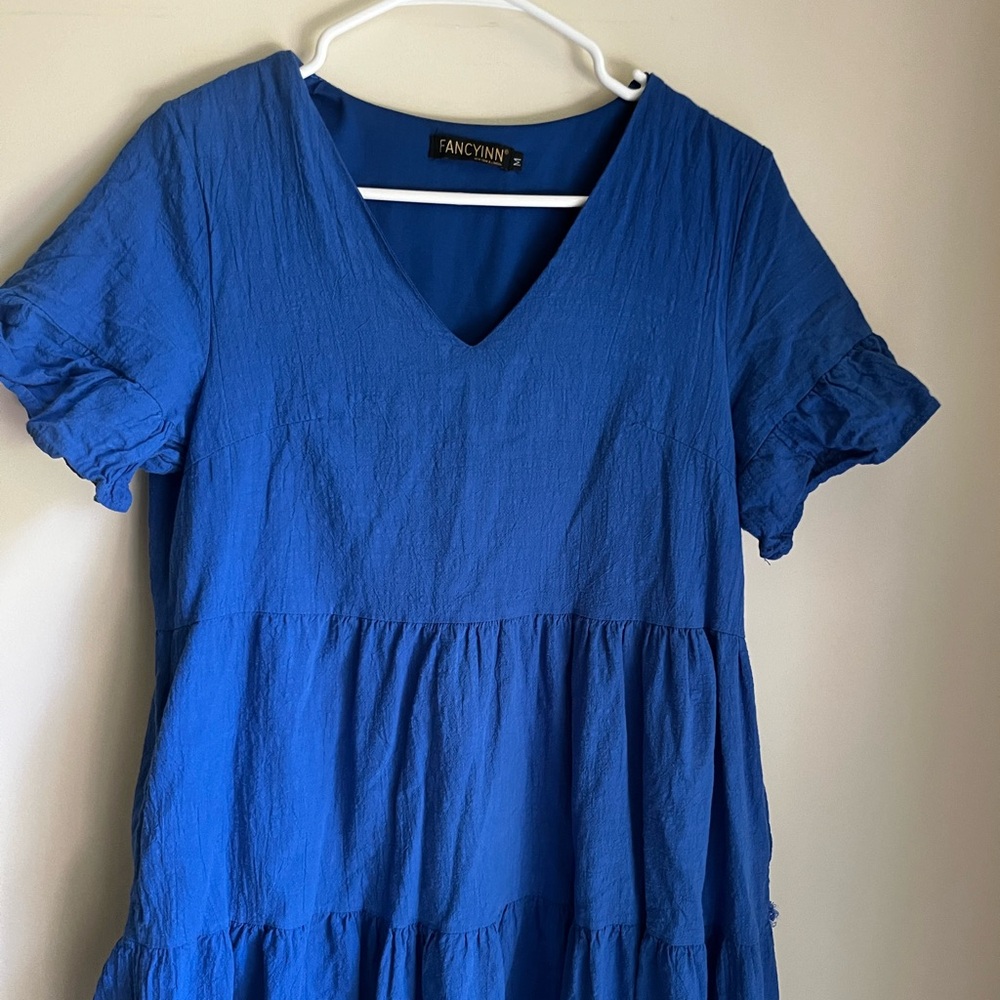 Boutique cobalt blue dress with ruffle sleeves. Size-Medium